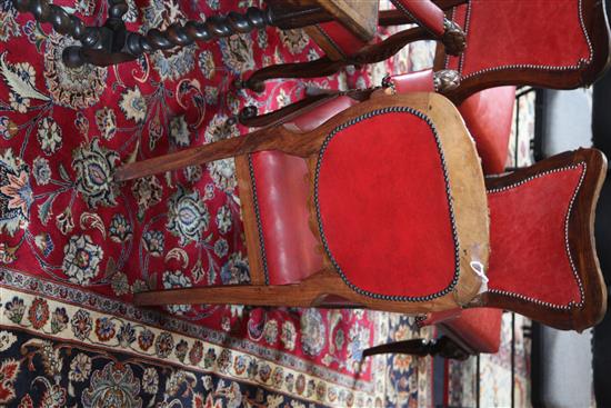 A set of six mid 19th century Anglo Indian carved padouk elbow chairs, W.2ft H.3ft 1in.